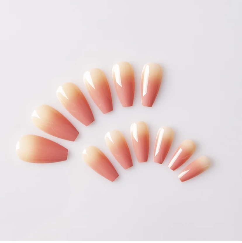 Peach Ome Nails In Coffin Shape.